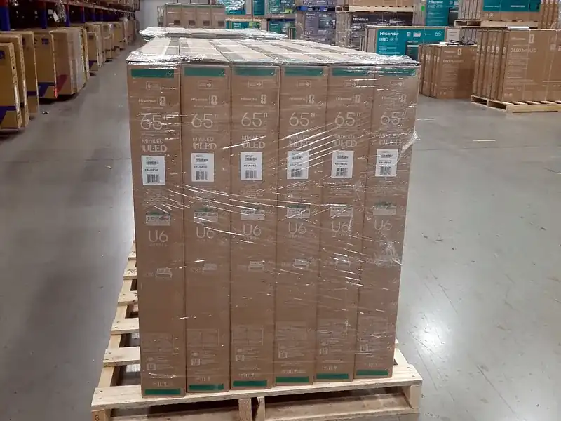A finished pallet of TV cartons, stacked and stretch-wrapped by our container unloading crew